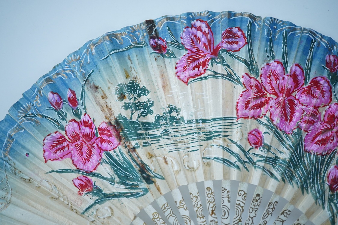 A collection of 19th century and later fans to include a black lacquered and lace example and a hand painted floral example